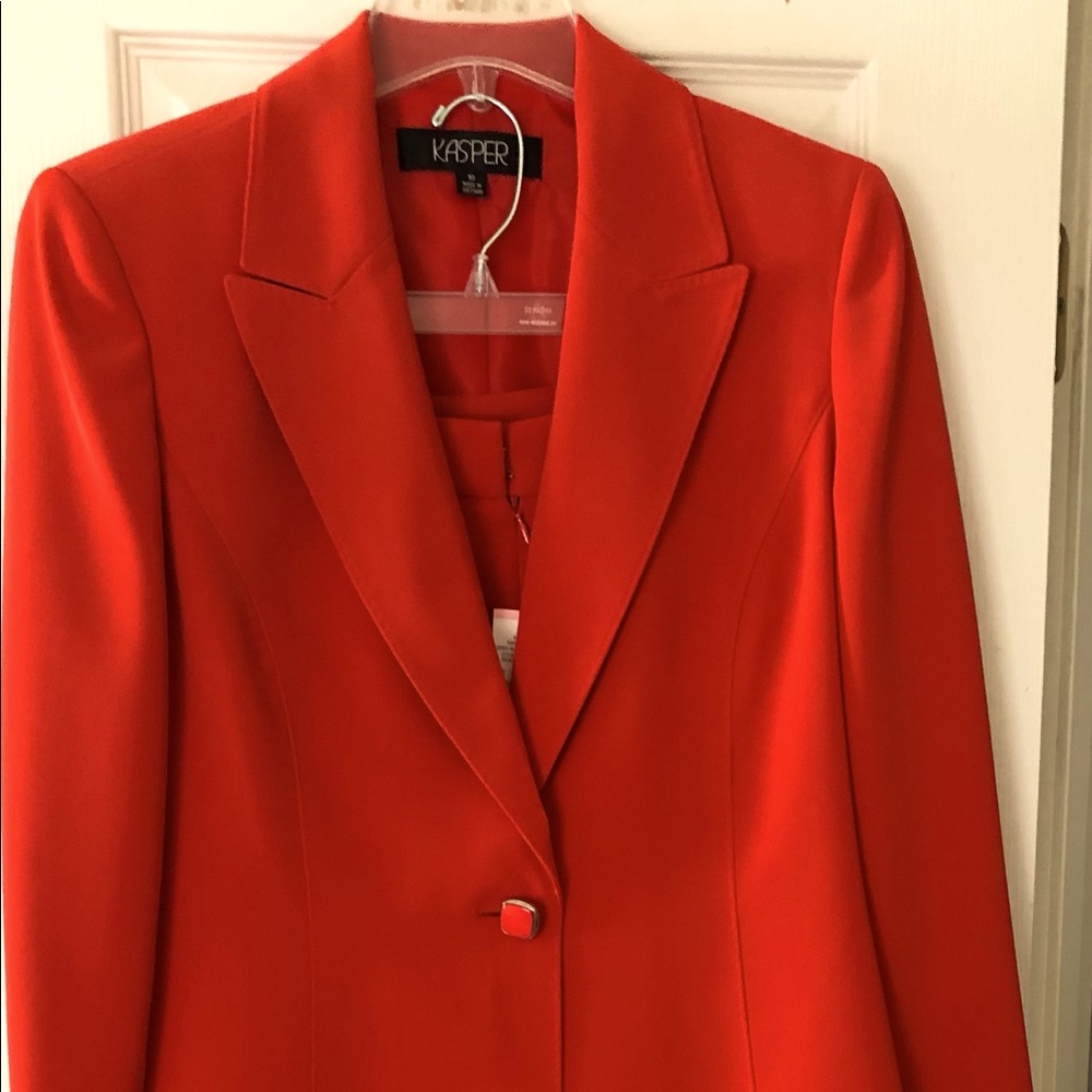 2-piece pants suit, new. Tags still on it.